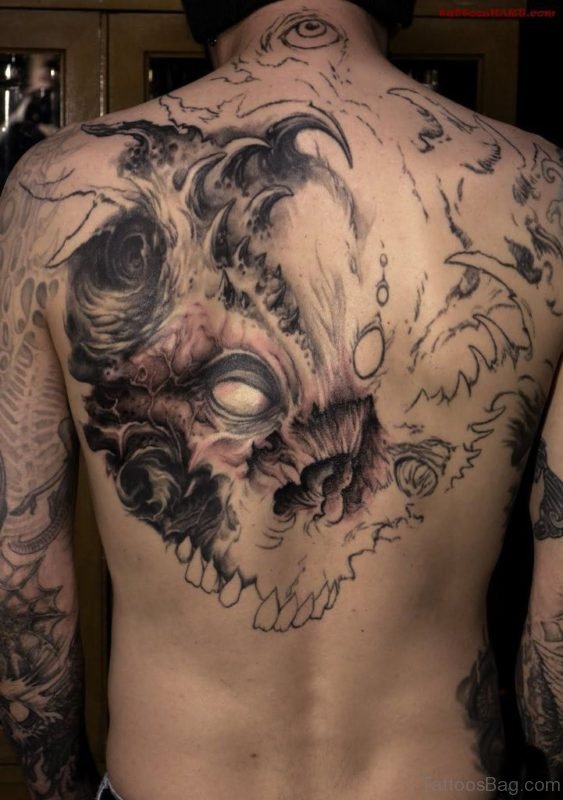 Huge Skull Tattoo On Upper BAck