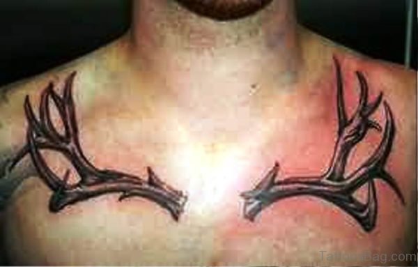 Image Of Antler Tattoo On Chest