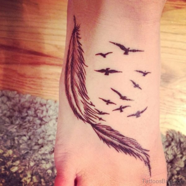 Impressive Birds And Feather Foot Tattoo