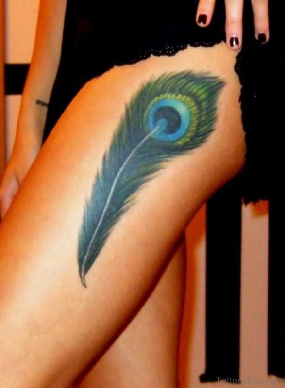 Impressive Feather Tattoo On Left Thigh
