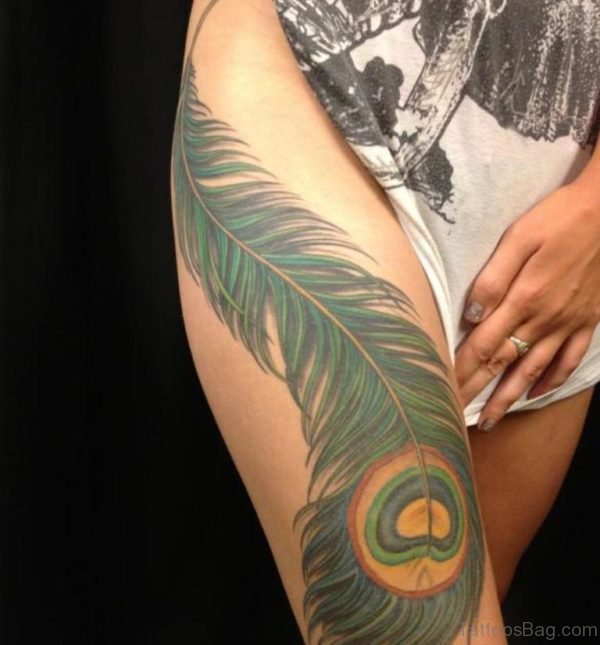 Impressive Feather Tattoo On Thigh