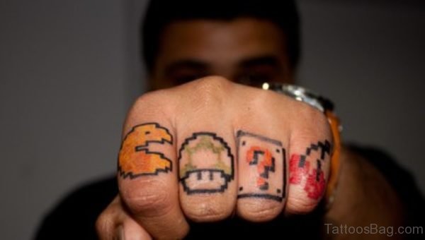 Impressive Pacman Finger Tattoo