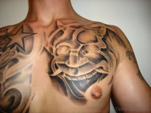 Japanese Mask And Star Tattoo Designs On Chest