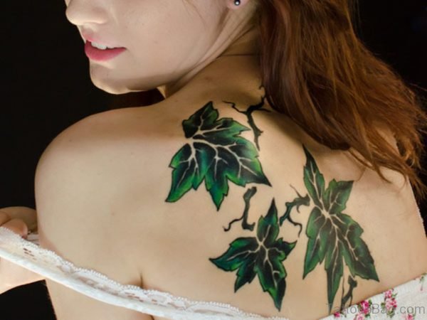 Ladybug And Green Leaves Tattoo