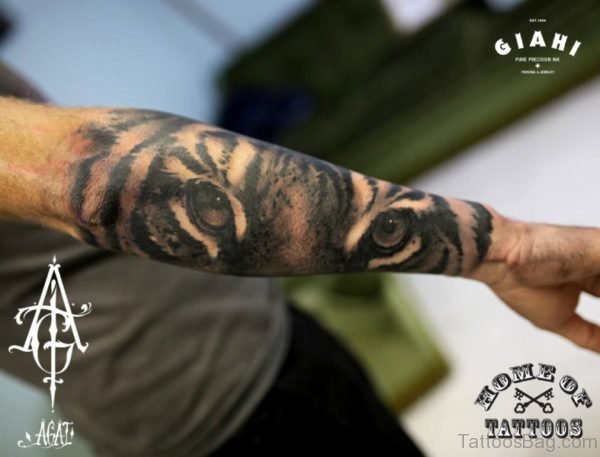 Large Lion Eye Tattoo On Arm