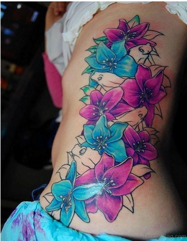 Lily Flower Tattoo On Rib