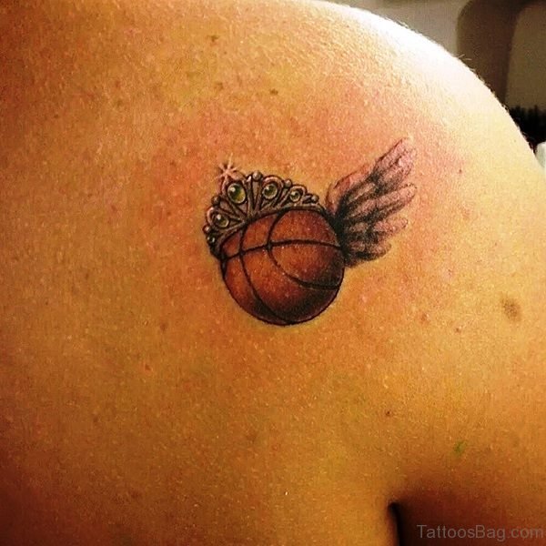 Little Crowned Basketball With Wings Tattoo