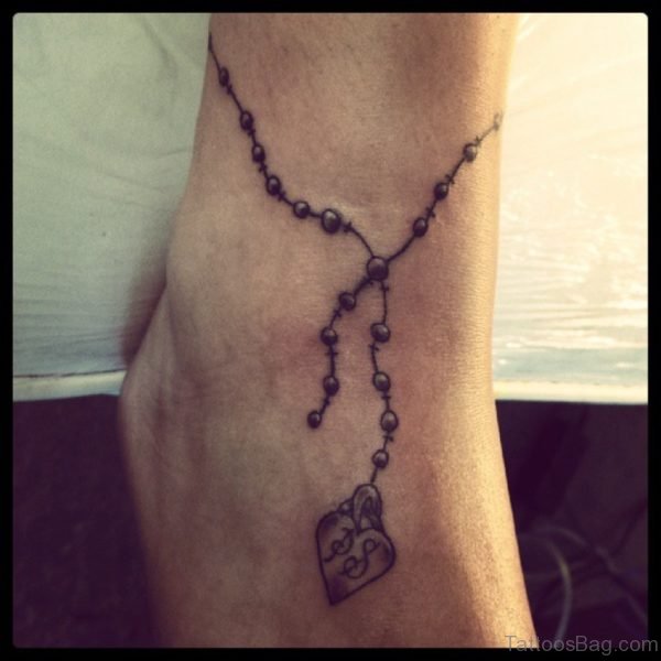 Lovely Ankle Rosary Tattoo
