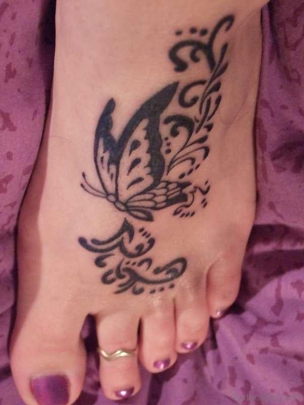 Lovely Black Butterfly Tattoo On Foot