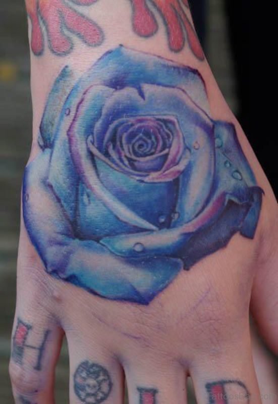 Lovely Blue Rose Tattoo On Hand