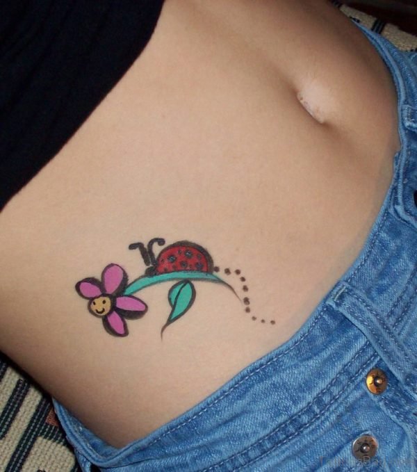 Lovely Daisy Flower Tattoo On Waist