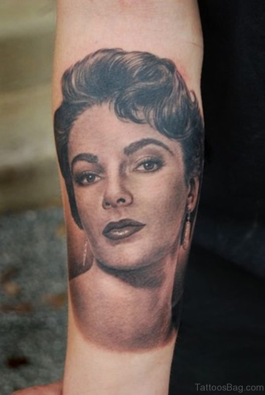 Lovely Elizabeth Taylor Portrait Tattoo On Arm 