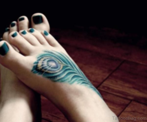 Magnifying Peacock Feather Tattoo On Foot