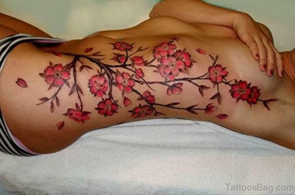 Magnolias Flower Tattoos On Rib 