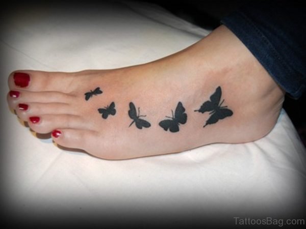 Nice Black Butterflies Tattoo