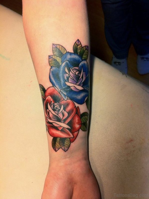 Nice Blue Rose Tattoo On Wrist