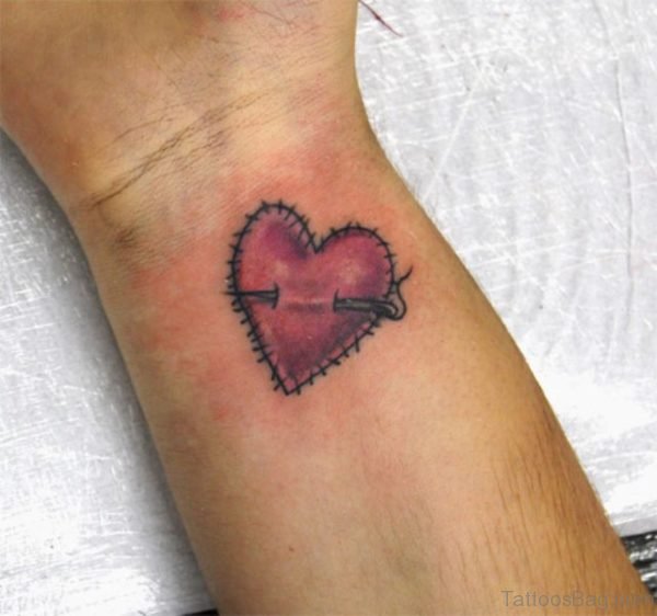 Nice Broken Heart Tattoo On Wrist