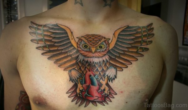 Nice Colorful Owl Tattoo On Chest