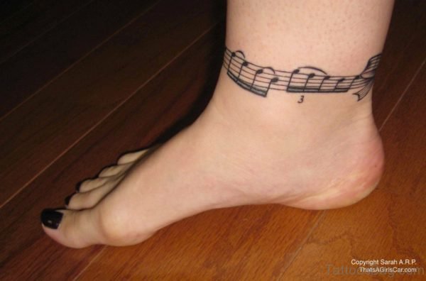 Nice Music Tattoo On Anle