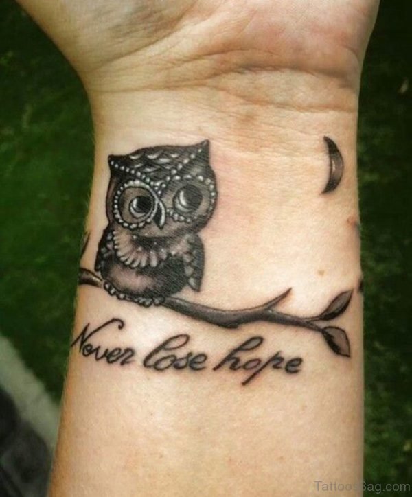 Nice Owl Tattoo On Wrist 