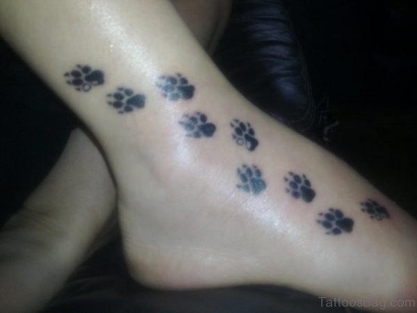 Nice Paw Print Tattoo On Foot