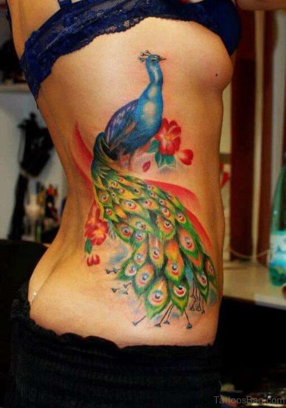 Nice Peacock Tattoo Design On Back