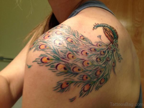 Nice Simple Peacock Tattoo On Shoulder