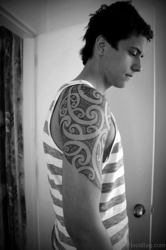 Nice Tribal Black And White Tattoo