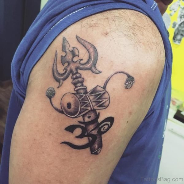 Nice Trishul With Pellet Drum And Om Tattoo For Men