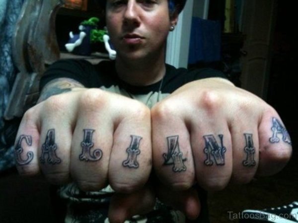 Nice Wording Tattoo On knuckle