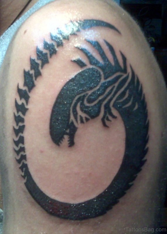 Ouroboros Alien Black Ink Tattoo On Left Shoulder