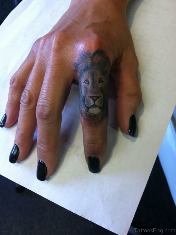 Outstanding Lion Tattoo On Finger
