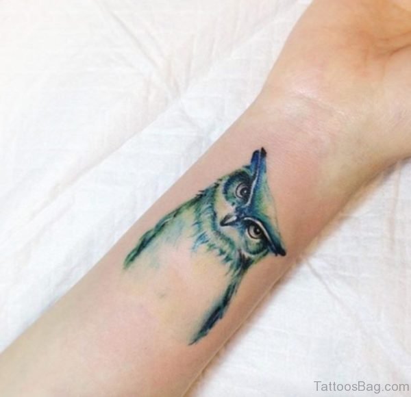Owl Face Tattoo On wrist 