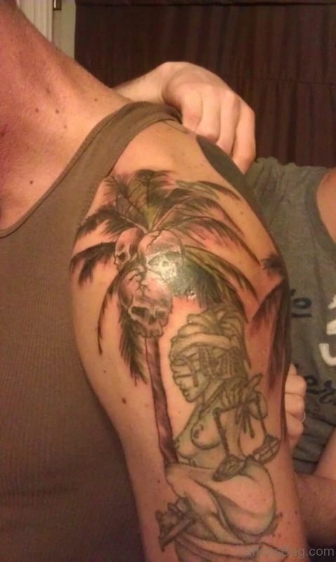 Palm And Skull Tattoo On Shoulder