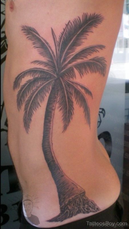 Palm Tree Tattoo On Left Rib Cage
