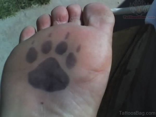 Paw Tattoo On Bottom Of Foot