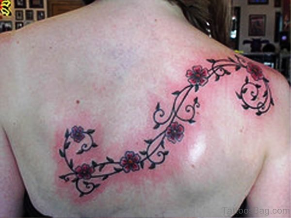 Photo Of Vine Tattoo On Back