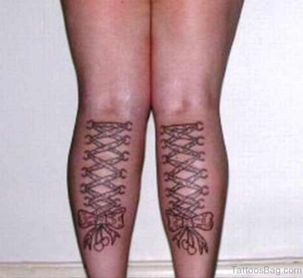 Picture Of Corset Tattoo On Both Legs