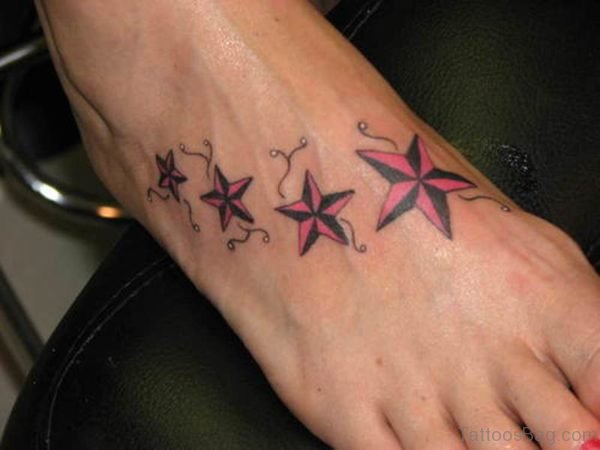 Pink And Black Star Tattoo on Foot