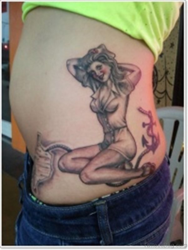Pinup Girl And Anchor Tattoo