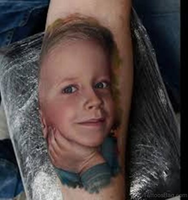 Portrait Tattoo On Wrist 