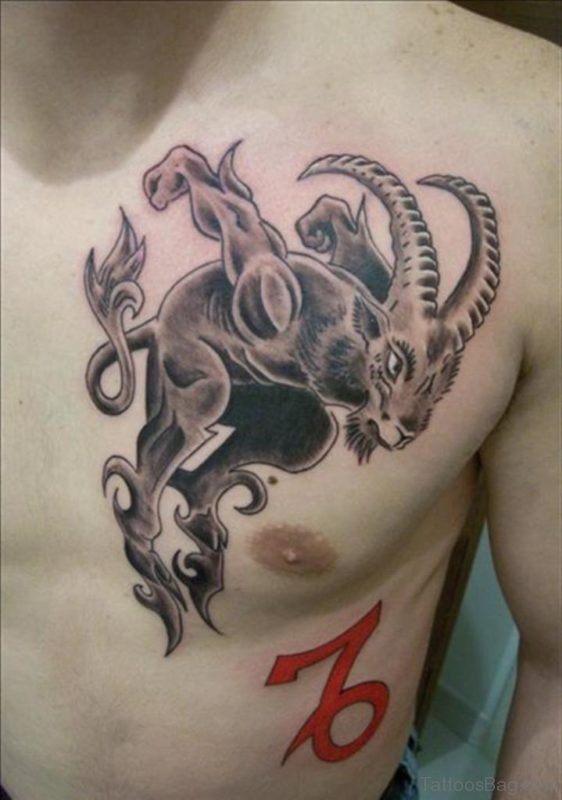 Red Capricorn Sign And Tribal Capricorn Tattoo On Chest For Men