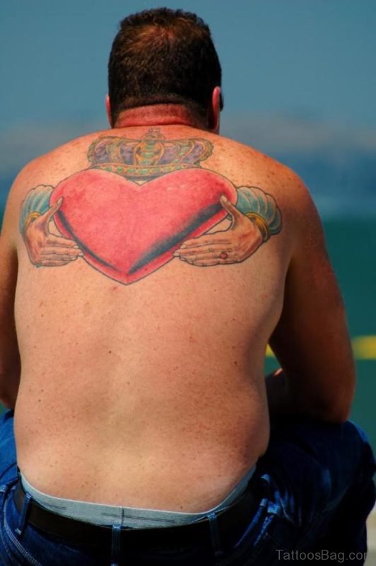 Red Heart Tattoo On Upper Back