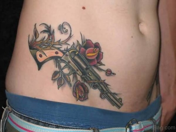 Red Rose And Gun Tattoo
