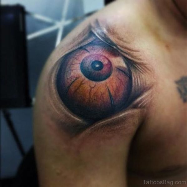 Ripped Skin Eye Tattoo On Right Shoulder