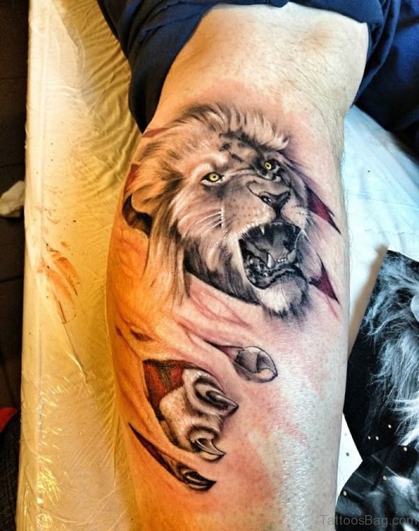 Ripped Skin Lion Tattoo On Leg