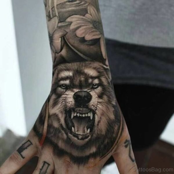 Roaring Wolf Tattoo On Hand 