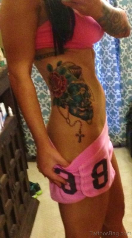 Rosary Tattoo On Girl Rib