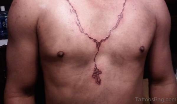 Rosary Tattoo On Man Chest