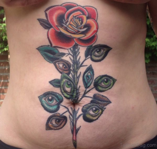 Rose And Eye Tattoo On Stomach